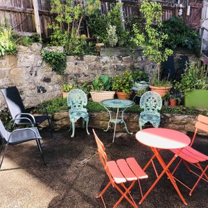 Seating in the rear courtyard garden.  at Redwing Gallery in Penzance