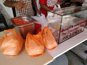 Donation is purely voluntary at Krsna's Free Meals in Central Singapore