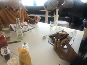 Burger with chips  at Gylly Beach Cafe in Falmouth