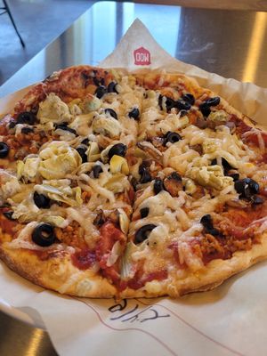 Plant based sausage, mushrooms olives,  artichoke at Mod Pizza  in Irvine