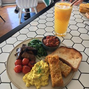 Big brekky w freshly squeezed OJ  at Crux in Semaphore