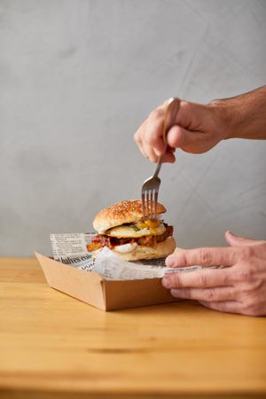 B+E breakfast burger (HOUSE BACON, HOUSE MADE EGG, HOUSE HASH BROWNS, MAYO, RELISH + CHIVES) at Crux in Semaphore