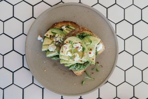 THE BASIC (AVOCADO, HOUSE PESTO, HOUSE MADE FETA + CHILLI FLAKES) at Crux in Semaphore