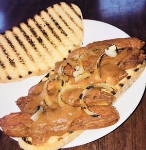 Organic Vegan sausage sandwich served on grilled spelt bread  at The Electric Vegan in Dublin