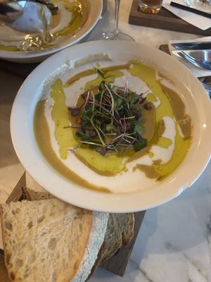 Vegan lemtil soup with coconut creamm  at Venue in Prague