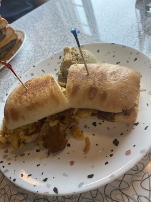 Poor lighting bit this is the Philly cheese and Mac steak with delicious potato salad  at Spiral Diner & Bakery in Dallas