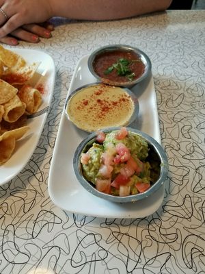 chip and dip party, featuring: happy tomato salsa, cashew cheese, and guacamole at Spiral Diner & Bakery in Dallas