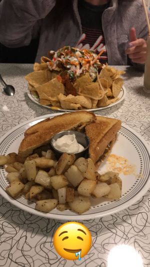 The buffalo chikn nachos were amazing!!! at Spiral Diner & Bakery in Dallas
