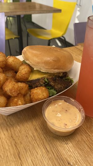Regular Burger with tots and fresh lemonade with flavors. Also extremely delicious   at Rutabagas in Lincoln