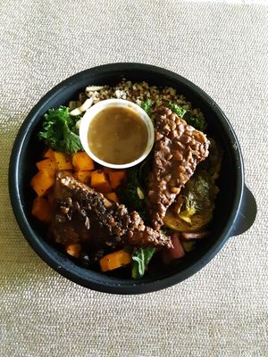 Kale'ing It Buddha Bowl with marinated and grilled tempeh at Rutabagas in Lincoln