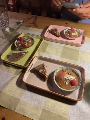 Chocolate torte and peach and raspberry mousse with almond cream and lavender seeds. Such delicate and delicious flavours!  at Bioristoro Cristo Re in Bienno