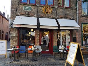front, with small terrace at Otomat in Bruges