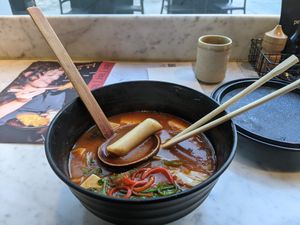 This bowl of lovelyness (korean dumplings, if memory serves) was spicy in all the right ways! at Wagamama - Bankside in London