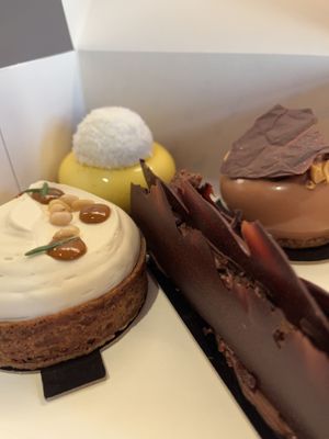 Tartelettes: 1. mango, 2. rosemary, 3. nuts, and a soft eclair made of mousse au chocolat  at Oh Faon in Marseille