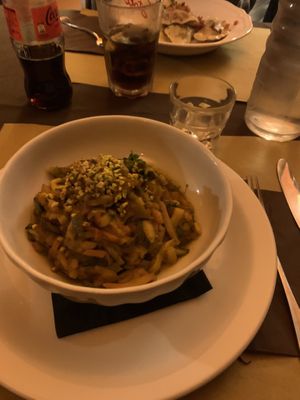 Stufato di verdure miste di stagione servito su tortino di patate gratinato al forno con paprika dolce e pistacchi   at Kowalski in Genoa