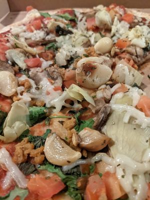 Vegan pizza with dairy free cheese and vegan Italian sausage at Mod Pizza in Easton