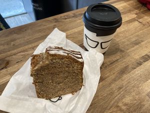 Vegan cake and oat cappuccino at Gregory's Coffee - 8th Ave in New York City