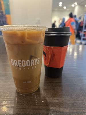 Hall & Oats and an oat milk latte  at Gregory's Coffee - 8th Ave in New York City