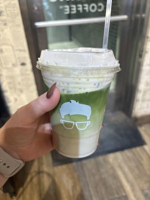 Blueberry matcha with vegan butter pecan cold foam  at Gregory's Coffee - 8th Ave in New York City