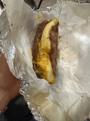 “Vegan deluxe” vegan egg, sausage, & cheese on chia croissant  at Gregory's Coffee - 8th Ave in New York City