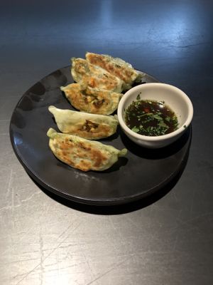 Vegetable gyozas & dipping sauce. at Wagamama in Chichester