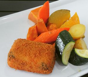 Spinach and semolina loaf with roast vegetables  at Whole Food Deli in Marrickville