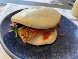 Vegan bacon Bao bun-supposed to be with mushrooms but turned up with spinach   at Wagamama - Wimbledon in South West London