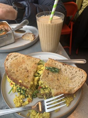 Tofu sandwich and almond dream smoothie   at Pipoca Vegan in South West London