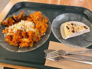 Very orange, the veg was mostly seasonal root vegetables. Raw vegan cheesecake on right. at The Green Door in Ottawa