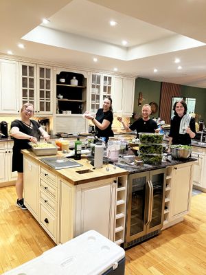 The kitchen crew at work for a wedding  at Knifey Spooney in Kingston