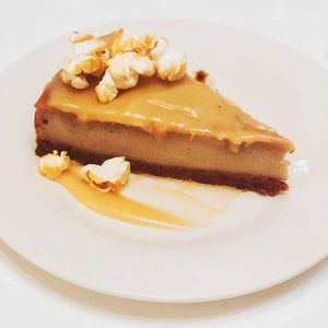Caramel popcorn cheesecake available for catering at Knifey Spooney in Kingston