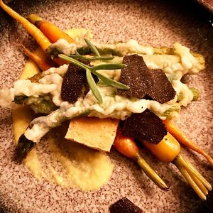 Asparagus tempura, baby carrots, tofu, cashew & corn sauce, black truffles. at Stokey Veg Vegan in North London