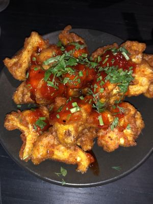 Beer battered cauliflower - delicious and spicy sauce  at The Fermentist in Christchurch