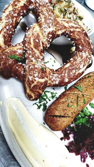 Oktoberfeast: soft pretzel with vegan weissewurst sausage & warm potato salad at The Fermentist in Christchurch