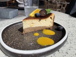 The "cheese" cake was amazing!!  at Cosme Kitchen Adaptation in Osaka