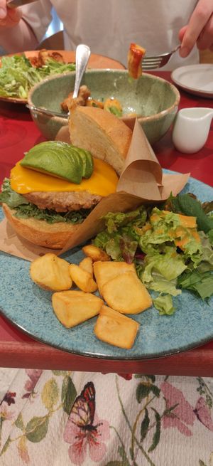 Plant based burger with vegan cheese at Cosme Kitchen Adaptation in Osaka