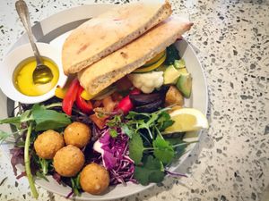 The falafel sandwich, pretty much an assemble your own falafel pitta! Super tasty ! at Cosme Kitchen Adaptation in Osaka