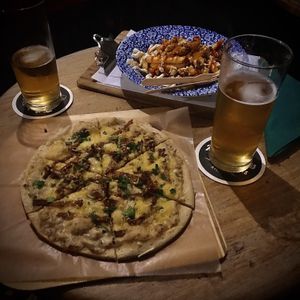 Vegan Carbonara pizza and fries at The Plasterers Arms in Norwich