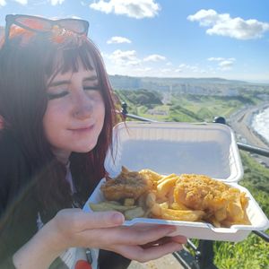 Me looking very happy with my vegan food at Capplemans Fish and Chips in Scarborough