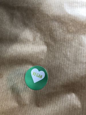 Takeaway packaging, clearly marked vegan  at Capplemans Fish and Chips in Scarborough