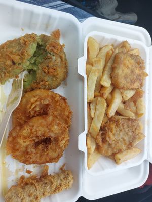 Battered tofu, mushy pea bomb, battered sausage and battered Pineapple. All so so tasty! at Capplemans Fish and Chips in Scarborough