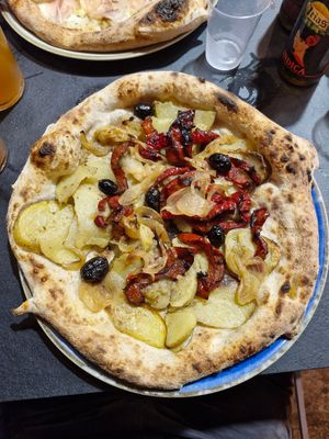 Veganima with potato, red peppers, onions and olives at Timilia in Palermo