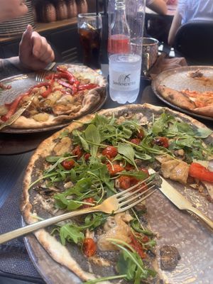 We tried 2 vegan pizzas - potato, pepper + onion (left) and mushroom (front)  at Timilia in Palermo