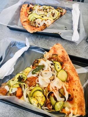 Vegan pizza slices  at Timilia in Palermo