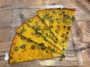 Socca cébettes (with spring onion)  at Chez Pipo in Nice