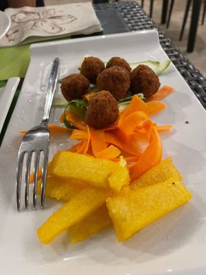Vegan homemade polpette with fried polenta at Zenzero in Taranto