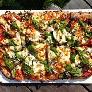 Garden Party Pizza - A medley of seasonal vegetables, house pesto and marinara.  Can be served with dairy free cheese and / or gluten free dough.
 at Lido Waterfront Bistro in Victoria