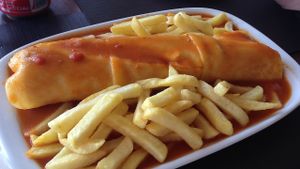 Cachorro com molho (Hotdog with francesinha sauce) at Spacos in Vila Praia De Ancora