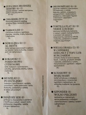 Menu. Vegan items are marked with "V", vegetarian with "W". at Klubojadalnia Młodsza Siostra in Warsaw