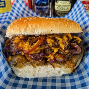 Classic British Vausage Bap with Melted Cheeze, Caramelised Red Onions and Garlic Buttered Mushrooms! at Vausages in Lichfield